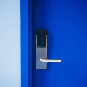 a blue door with a electronic lock